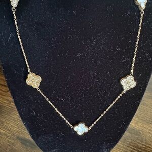 Elegant Gold and Silver Clover Necklace